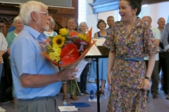 Rhudian presenting the bouquet